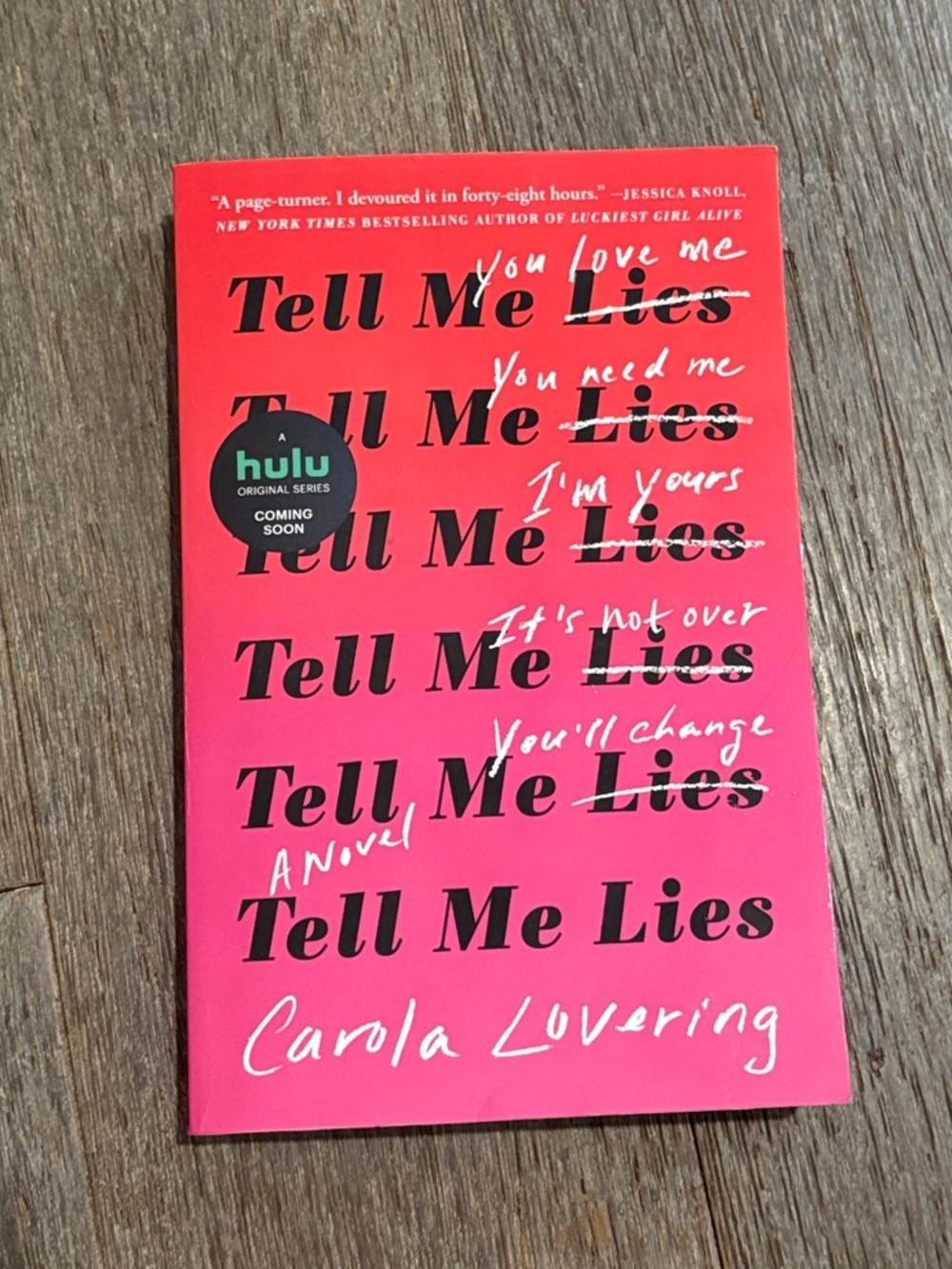 Tell Me Lies by Carola Lovering - Pink Paperback Novel